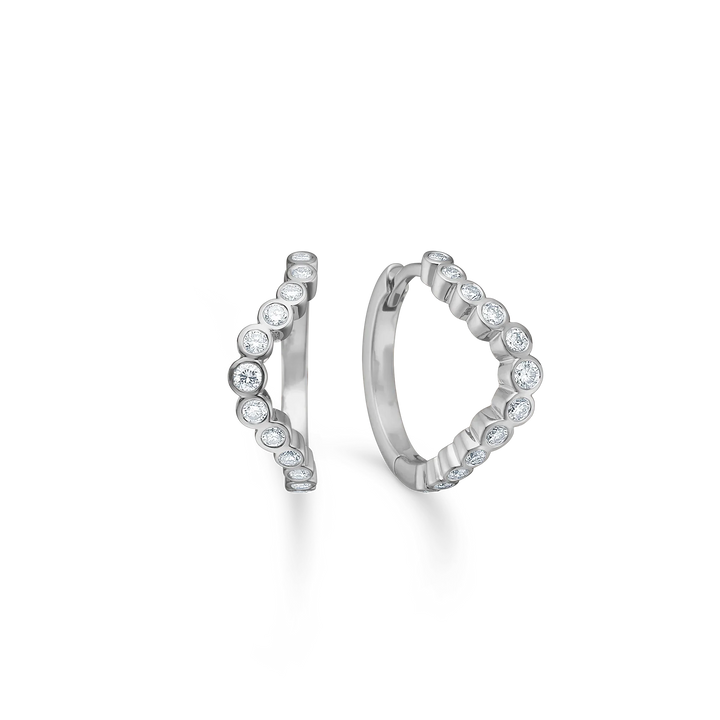 Silver earrings hoops with round clear stones, front and side view, elegant design