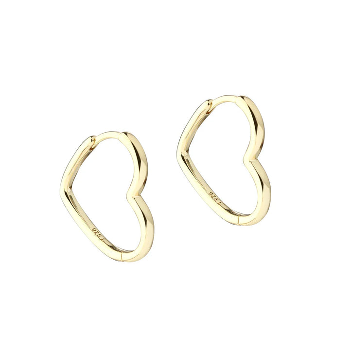 Heart-shaped earrings in gold-colored metal, front view, simple and elegant design