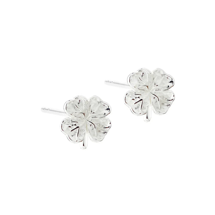 Silver four-leaf clover ear studs, obverse, detailed floral design, polished surface