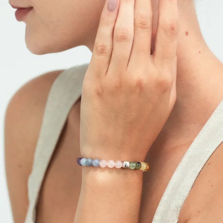 Alexander Lynggaard Bracelet Saint Tropez 6mm shown on a woman's hand, colorful stone balls. Model c10550-001-2.