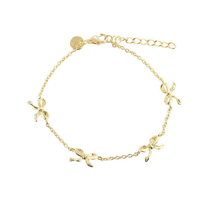 Aqua Dulce Curve Bow Armband gold plated with small bow details and adjustable chain, Model 5960-5960-1