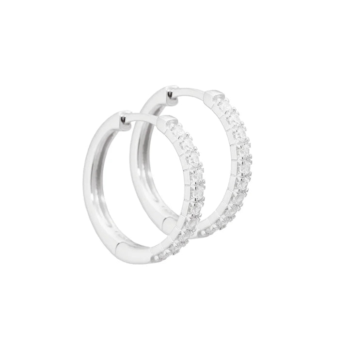 Aqua Dulce Darling Earrings 20 mm silver, front image of shiny hoops with small clear stones. Model 3826-3826-1