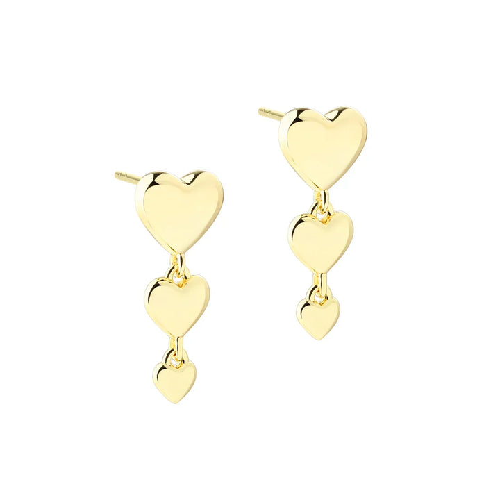 Aqua Dulce Karla and Me Long Earrings show golden earrings with three heart links. Model 6422-1