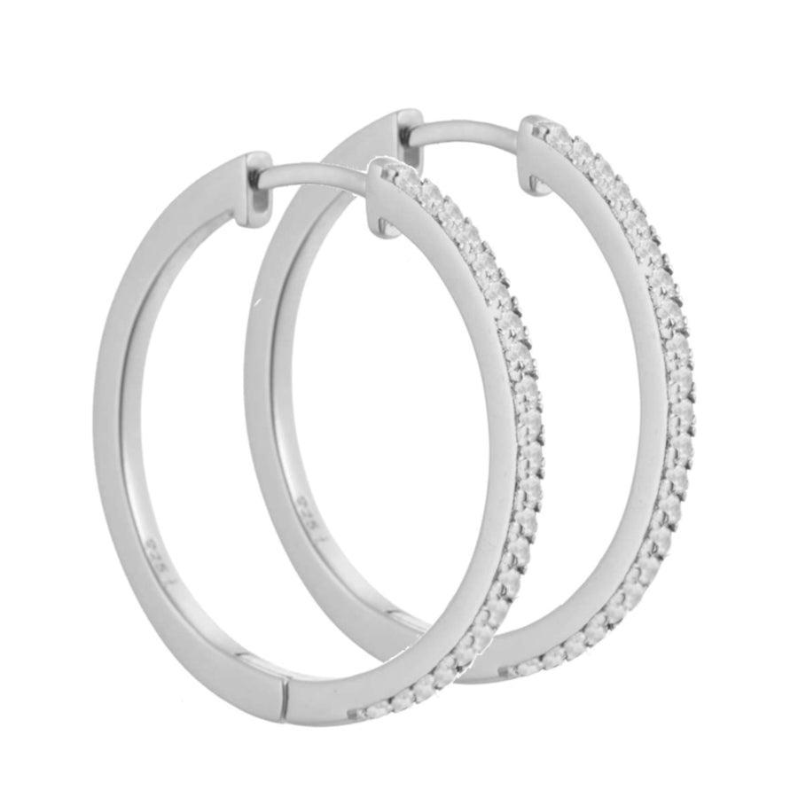 Aqua Dulce Raya Creol 925 sterling silver appears as elegant earrings in silver with small clear stones. Model 4549-4549-1