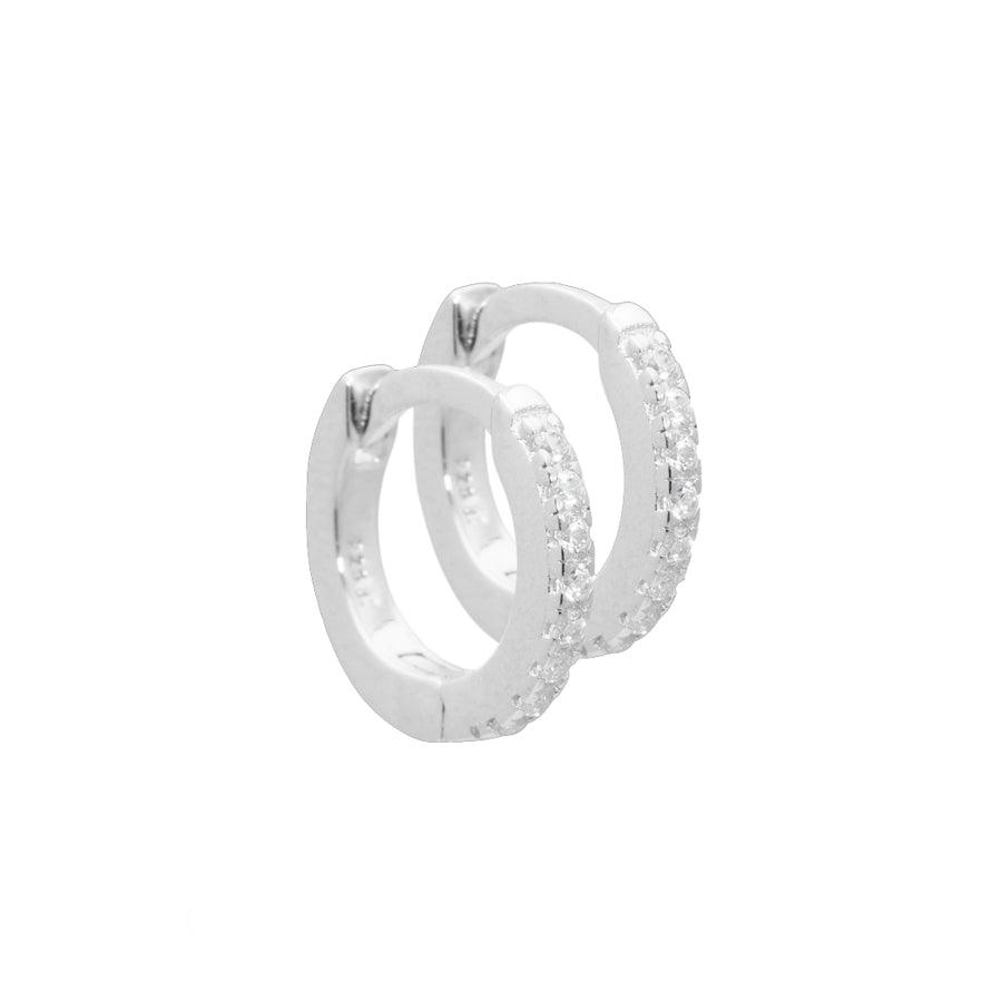 Aqua Dulce Raya Creole Silver shows a pair of small creoles in silver with clear sparkling stones, Model 4036-4036-1.