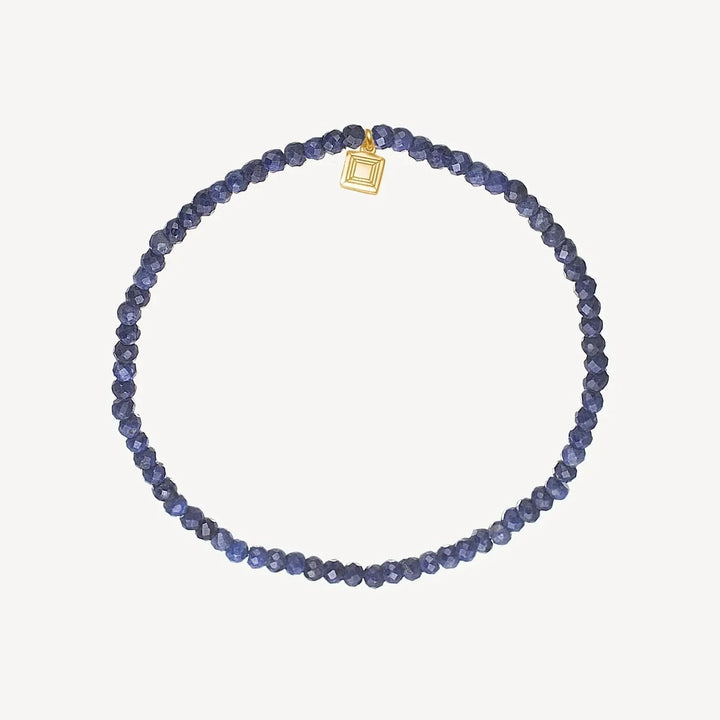 carre savannah bracelet with sapphire gold-plated, round blue sapphire beads and small gold-plated detail. Model fb4541sa-1