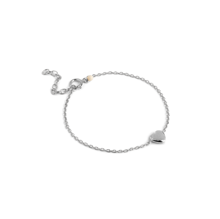 Enamel Amore Bracelet In Silver shows a simple bracelet in silver with a heart detail. Model B141S-1
