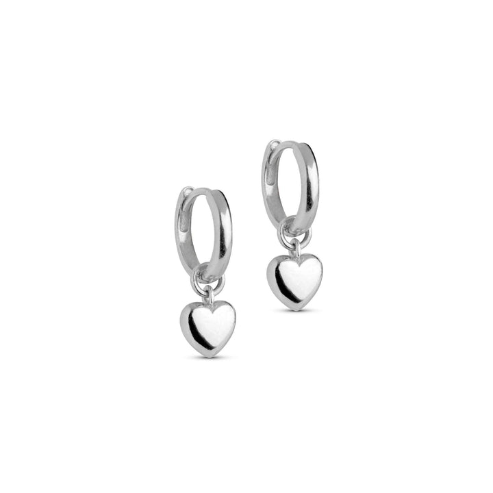 Enamel Amore Solv Hoops shows a pair of silver hoops with a shiny heart pendant against a white background. Model E376S-E376S-1.