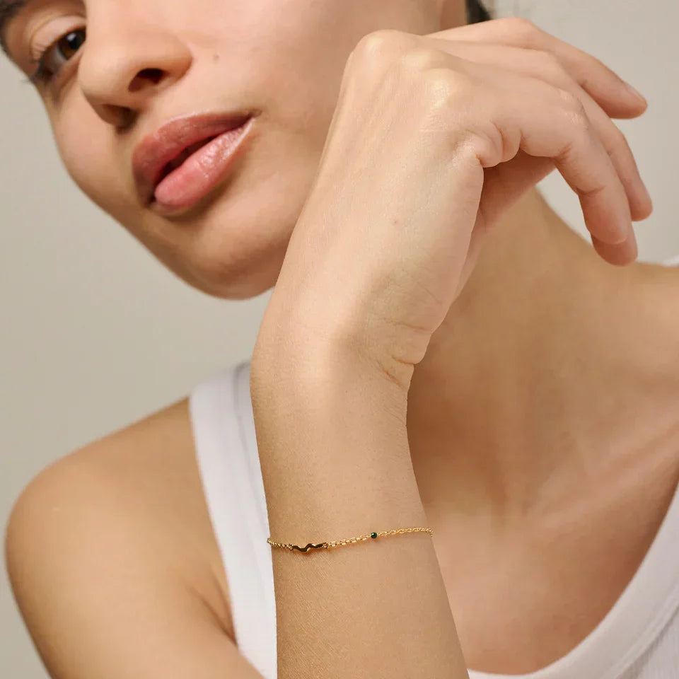 Enamel Etta Bracelet in gold-plated silver worn by women. Elegant, thin gold bracelet. Model b149g-1