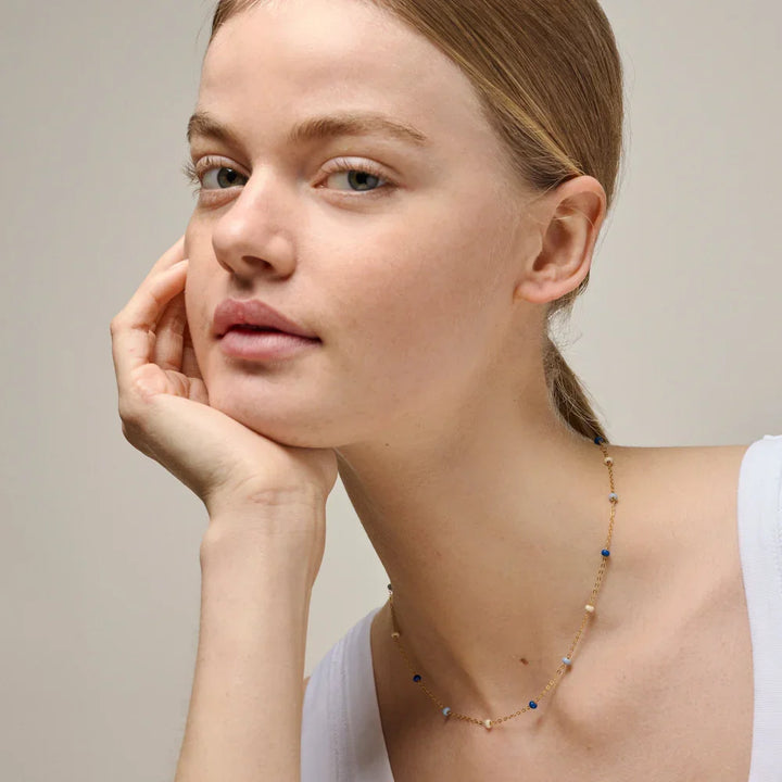 enamel-lola-bold-necklace-marine-in-gilt-sol n137g-marine shown on model, fine gold chain with blue and light pearls, Model n137g-marine