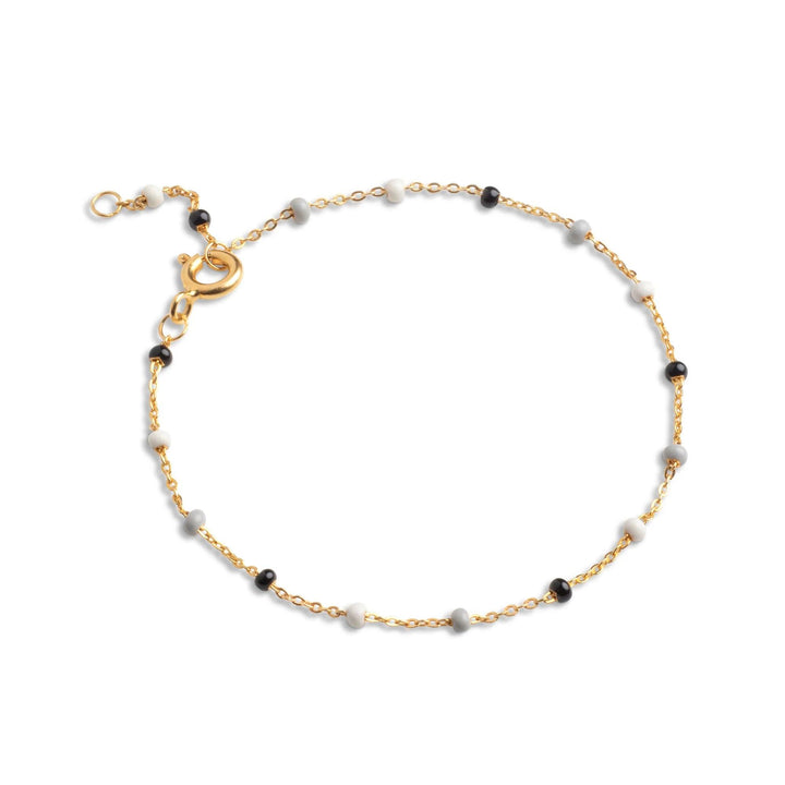 Enamel Lola Salt n Pepper Bracelet with fine black and white pearls on a gold-coloured chain. Model b66g-saltpepper-b66g-saltpepper-1