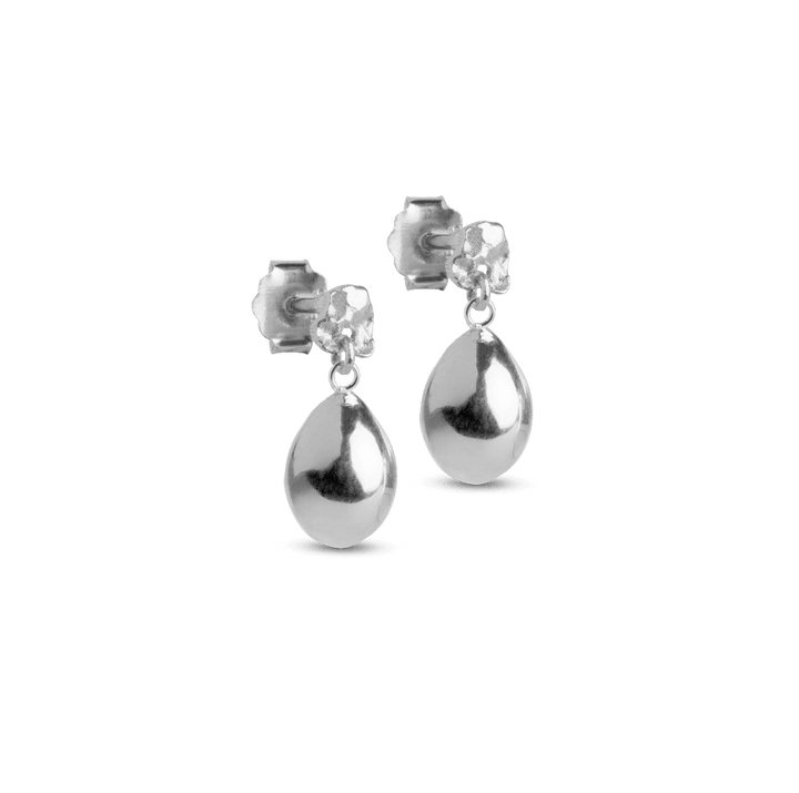 enamel-poe-studs-i-sol, silver drop-shaped studs photographed against a neutral background. Model e385sm-1