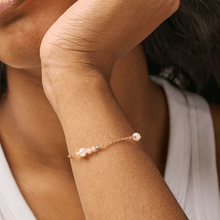 enamel sofia bracelet bracelet with pearls in pink and gold on the woman's hand, Model b136gm-lightpink
