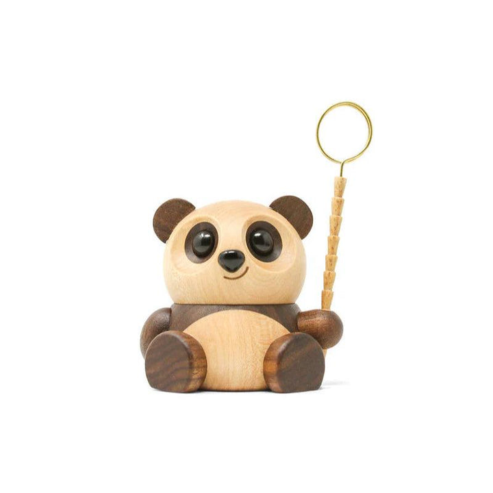 Fablewood The panda Chi Chi sitting in light and dark wood with a large ring in the paw, Model 1407-2.