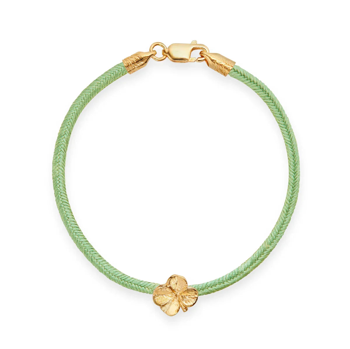 Flora Danica Clover Silk Bracelet Light Green Gilt shows an elegant light green silk bracelet with gilt clover detail and clasp. Model 907-flc-silk-lightgreen-g-001-1