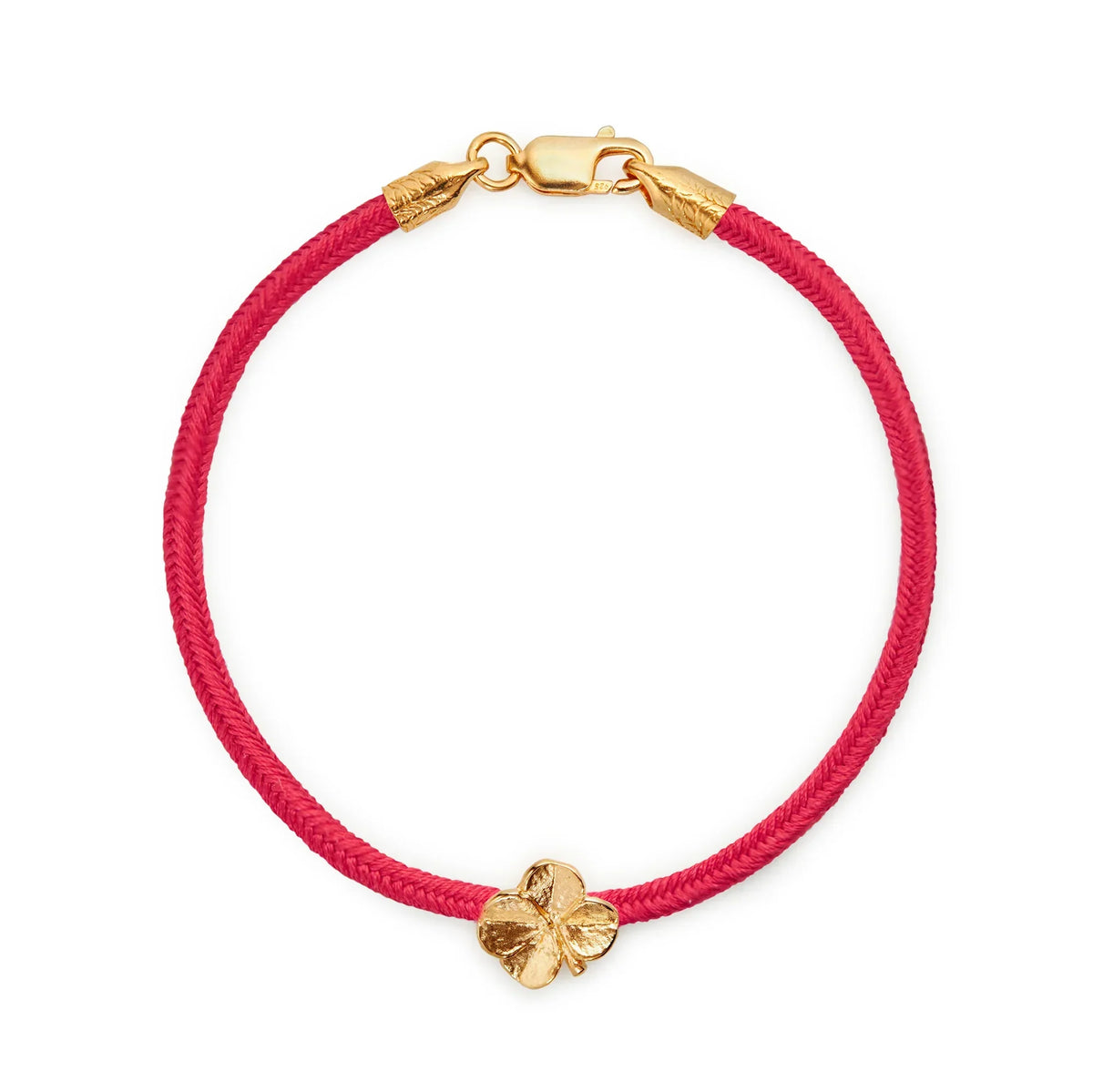 Flora Danica Firklover Silk Bracelet Coral Red shown here with red silk cord and gilded clover detail. Model 907-flc-silk-red-g-001-1.