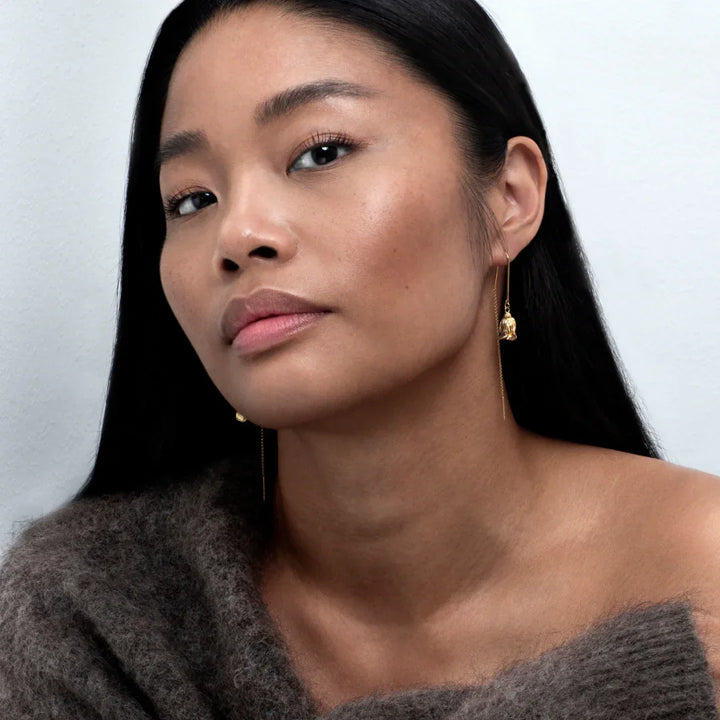 Flora Danica Rose Earrings gold plated shown worn by model, elegant design in gold, Model 42728-45-28