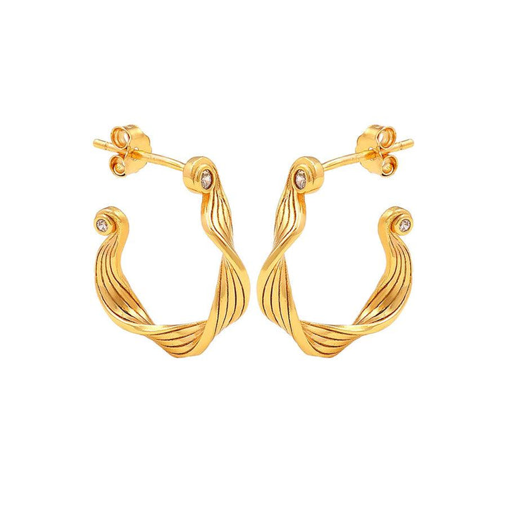 Hultquist Copenhagen Audrey gold plated hoops with twisted design and small clear stones. Model S08601G-1