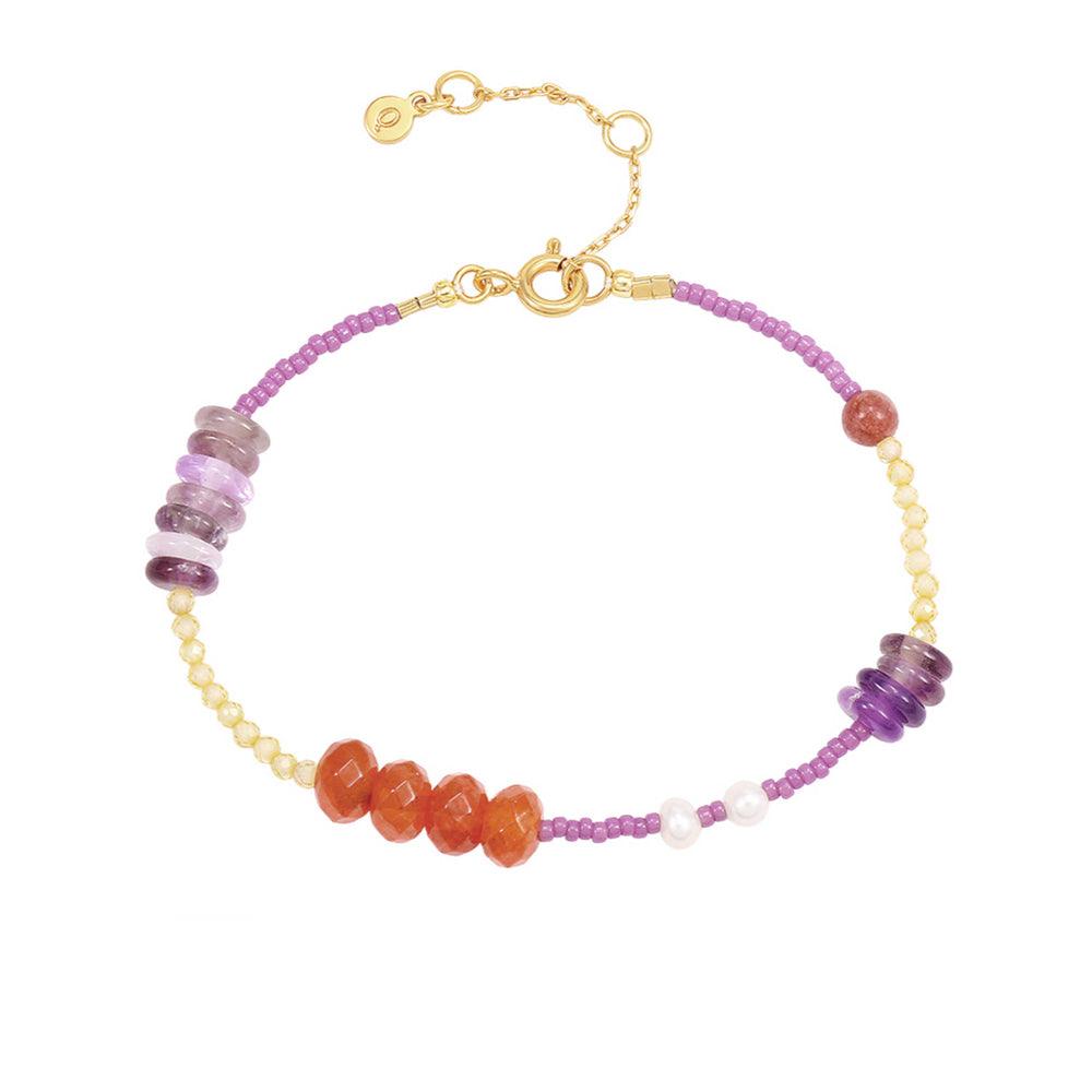 Hultquist Copenhagen Elsie Pearl Bracelet with purple, orange and yellow pearls in a golden chain. Model S08585G-1