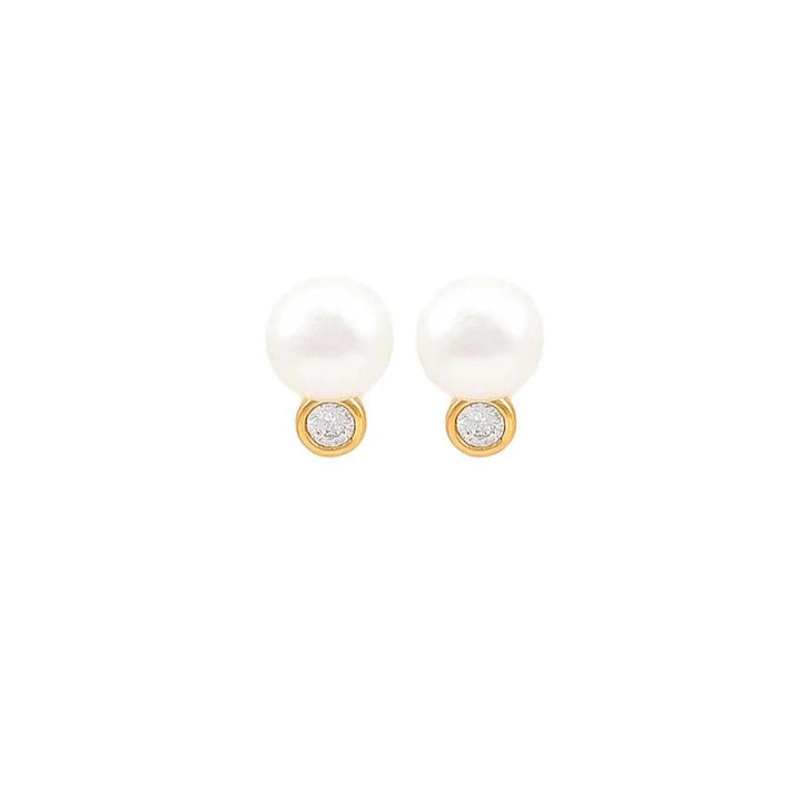 Hultquist Copenhagen Harper Pearl gold plated earrings shown from the front with white pearl and small clear stone. Model S08605G-2