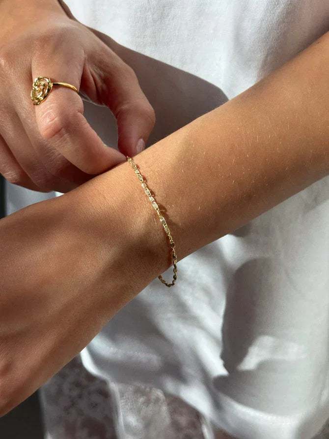 Jeberg Jewelery Effy Bracelet in gold-plated silver shown on wrist in sunlight. Model 44280-16-G-2