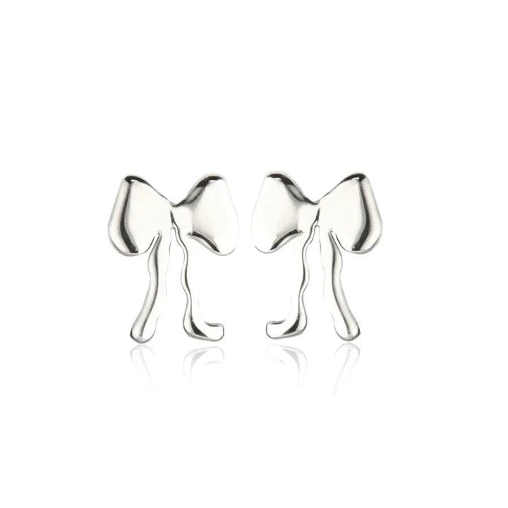 Jeberg Petite Bow Plain Stud in silver, elegant bow earrings in glossy finish on white background. Model 52822-1