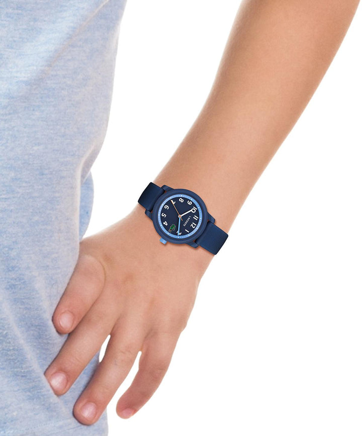 Lacoste Junior WATCH 12.12 BLA shows a blue children's watch on wrist, round dial, Model 2030043