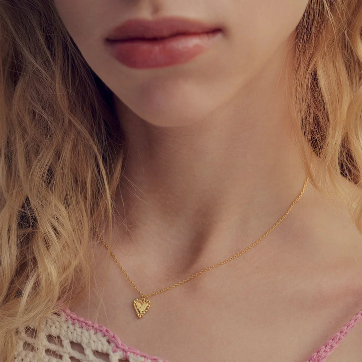 The Moonstone Fatal Heart Gold Plated Necklace appears on a woman's neck, Model 2810a-2