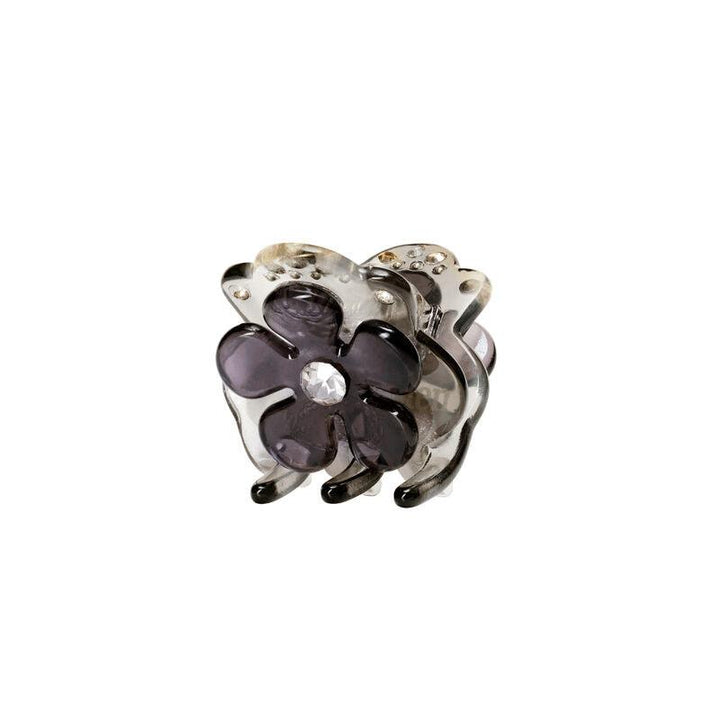 maanesten-kalina-fog-hairclaw shows a decorative hair clip with purple flower and clear stone in front. Model 3834