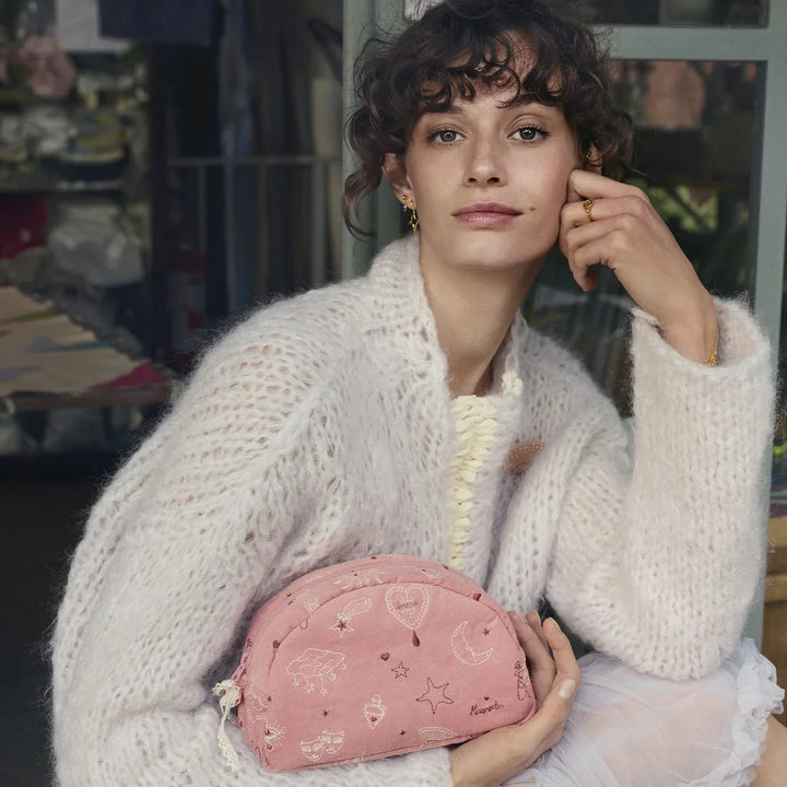 Maanesten Makeup Bag Medium Magical Pink shown in use, soft pink velor with embroidery, Model 4101-2