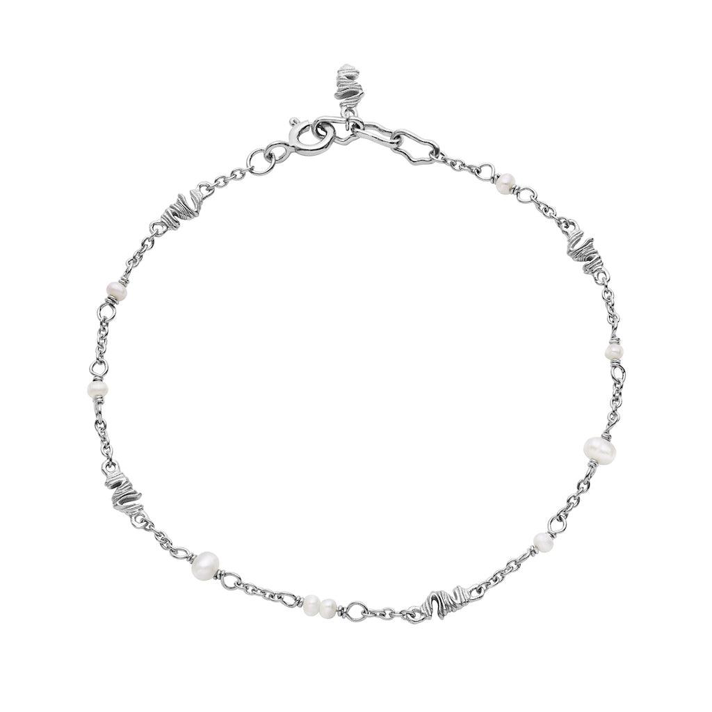 Maanesten Mero silver bracelet with small white pearls and unique silver details on a white background. Model 8581c-8581c-1