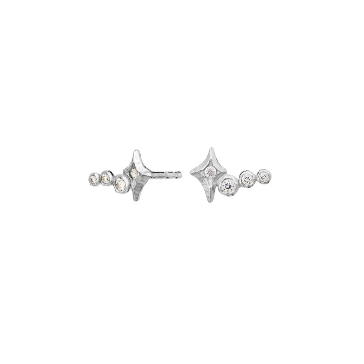Maanesten Minna silver earrings with clear stones in an asymmetrical design, seen from the front. Model 10044c.