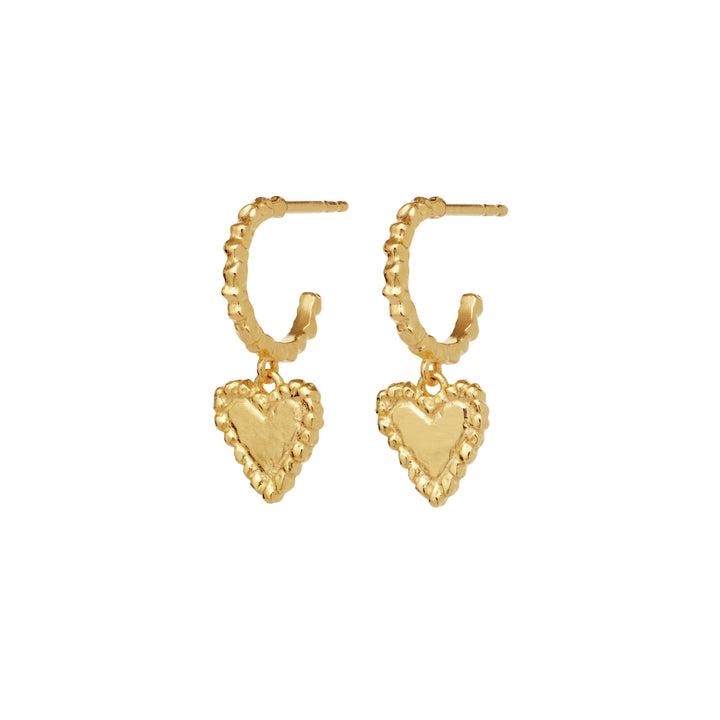 maanesten-rosalinde-gold-plated-heart-creole shows a pair of gold-plated creoles with structure and heart pendant, Model 10054a-1.