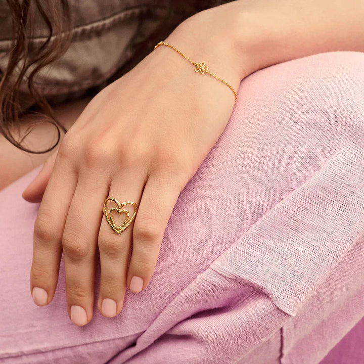 Maanesten Salwa gold plated bracelet with flowers displayed on wrist, delicate floral detail, Model 8699a-2.