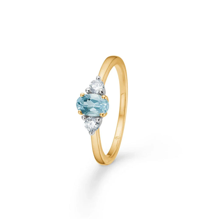 Mads Z 14kt Golden Sky ring with topaz and diamonds shown in gold with blue oval topaz and clear diamonds, Model 1546128-001