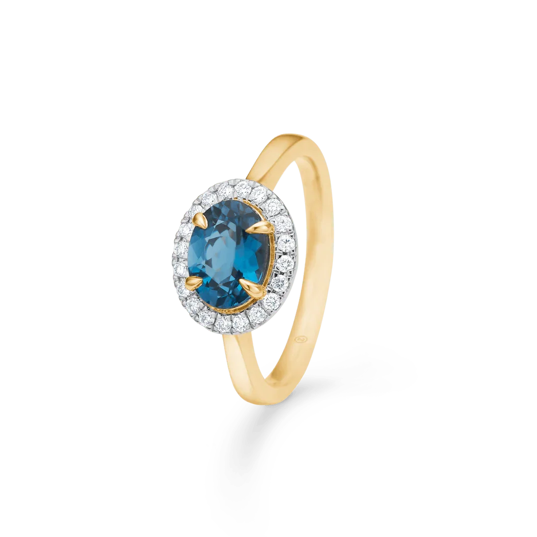 Mads Z 14kt Midnight Blue Diamond Ring with oval blue topaz and diamonds in a gold setting. Model 1546118-001-1.