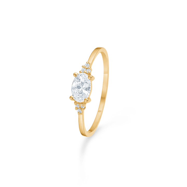 Mads Z Alicia 8 kt. gold ring with oval zirconia, slim model with clear stones. Model 3347056-001
