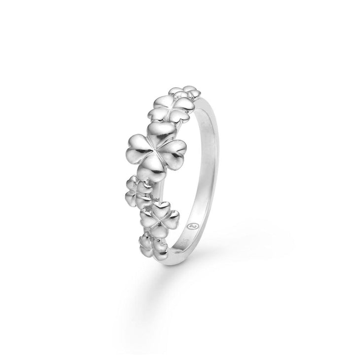 Mads Z Clover Love silver ring with several shiny four-leaf clovers, elegant design. Model 2140185-001