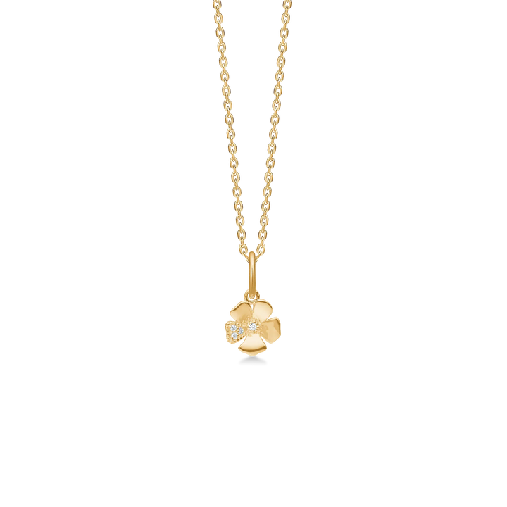 Mads Z Fleur 14kt gold pendant with diamonds 7mm is seen as a flower-shaped pendant with diamonds in bright gold. Model 1531111-1