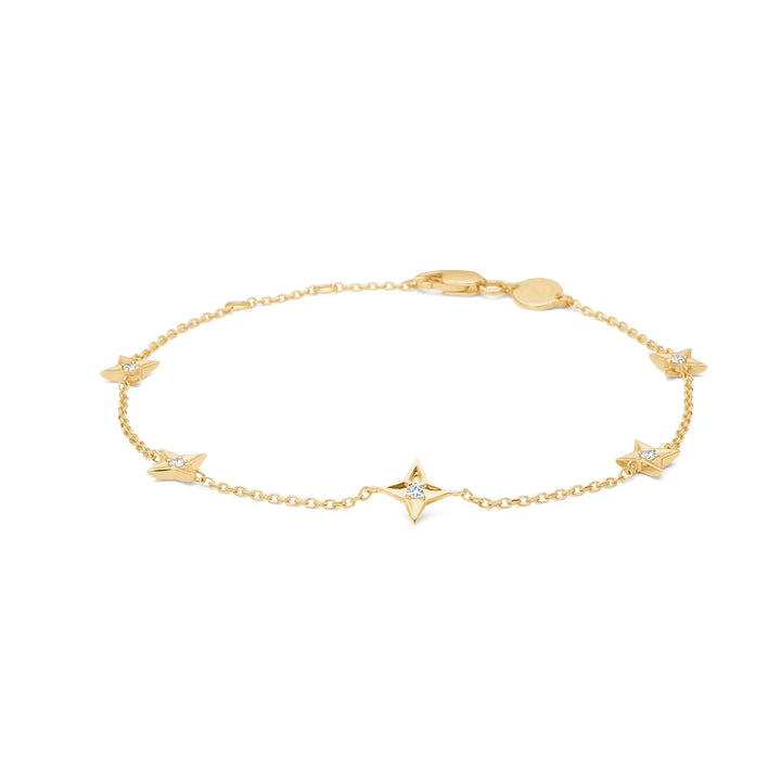 Mads Z Vesper 14kt gold bracelet with stars, diamonds in star details, elegant design. Model 1551197-1