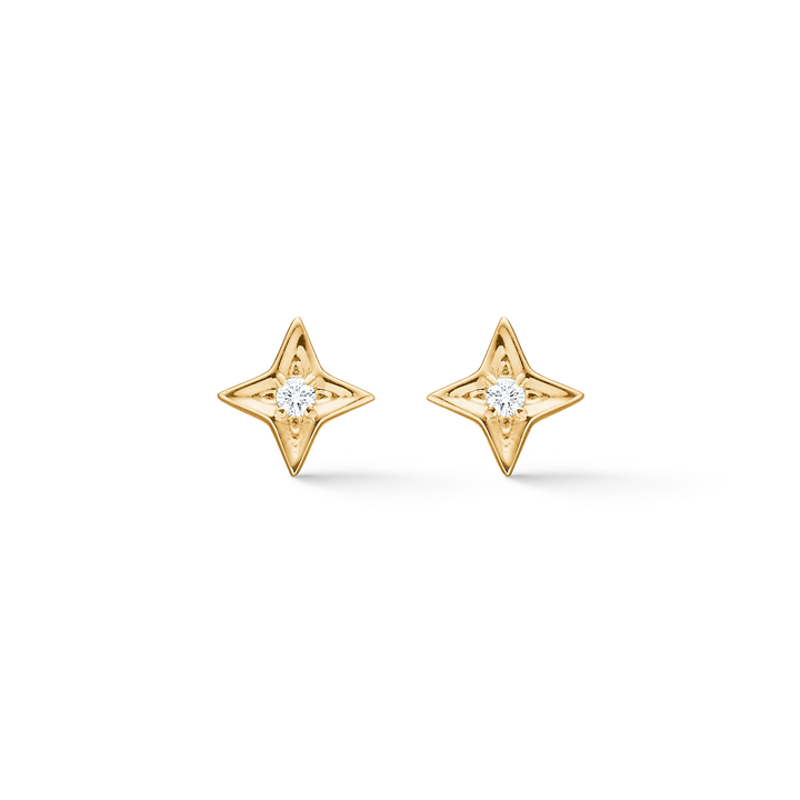 Mads Z Vesper 14kt gold stud earrings feature a star-shaped design with a clear diamond in the center. Model 1511197-1