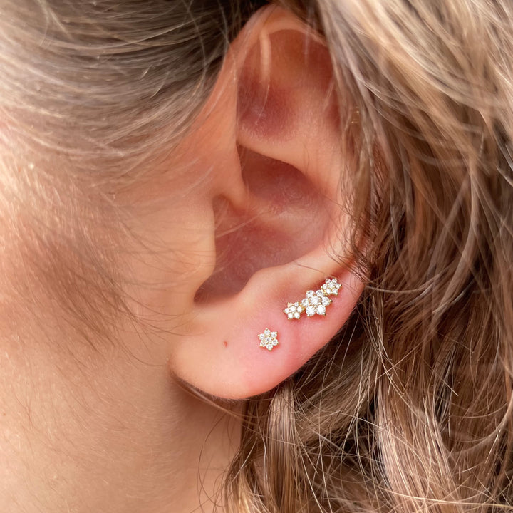 Maria Tash Diamond Flower Treaded Stud Earring 3mm in ear, floral design with clear diamonds in gold. Model xfld-yg-w3-001-2