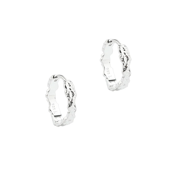 Silver bracelet earrings in textured design, front view, rustic silver look, 925 stamp visible