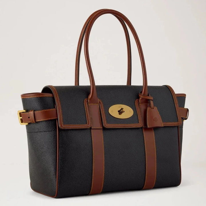 Mulberry Bayswater Black and Cognac Bio-Based Scotchgrain handbag in black and cognac with gold details. Model HH0014127A340
