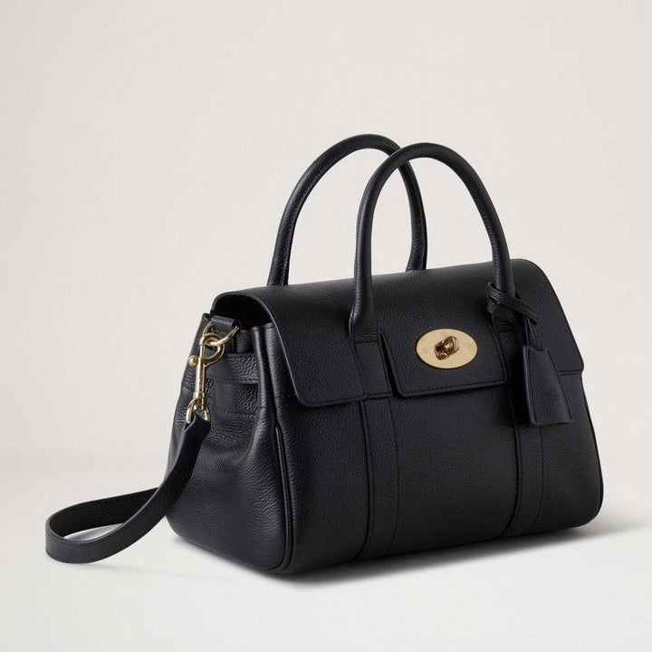 Mulberry Bayswater Satchel Black Small Classic Grain shows a black leather bag with gold buckle and shoulder strap. Model HH9216205A100