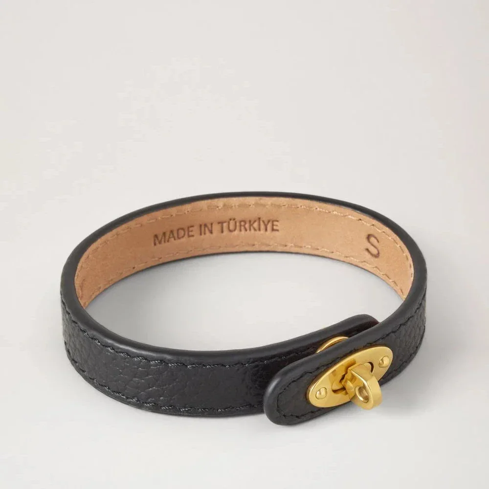 Mulberry Bayswater Thin Leather Bracelet in black leather with a gold-coloured buckle, seen against a white background. Model QB2390205A100-001