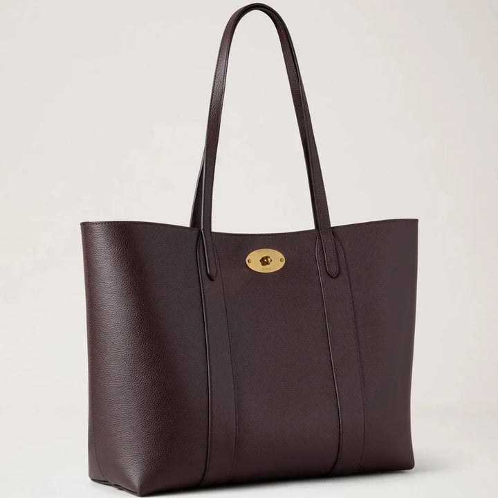 Mulberry Bayswater Tote Ebony Small Classic Grain features a dark brown leather bag with a gold-tone clasp. Model HH5727205A110
