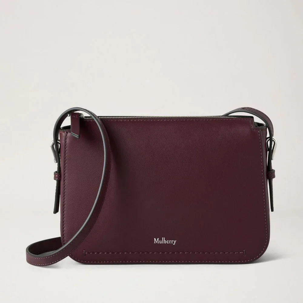 Mulberry Clovelly Pouch Black Cherry Micro Classic Grain shows an elegant dark brown leather pouch with adjustable strap. Model RL8729587K560.