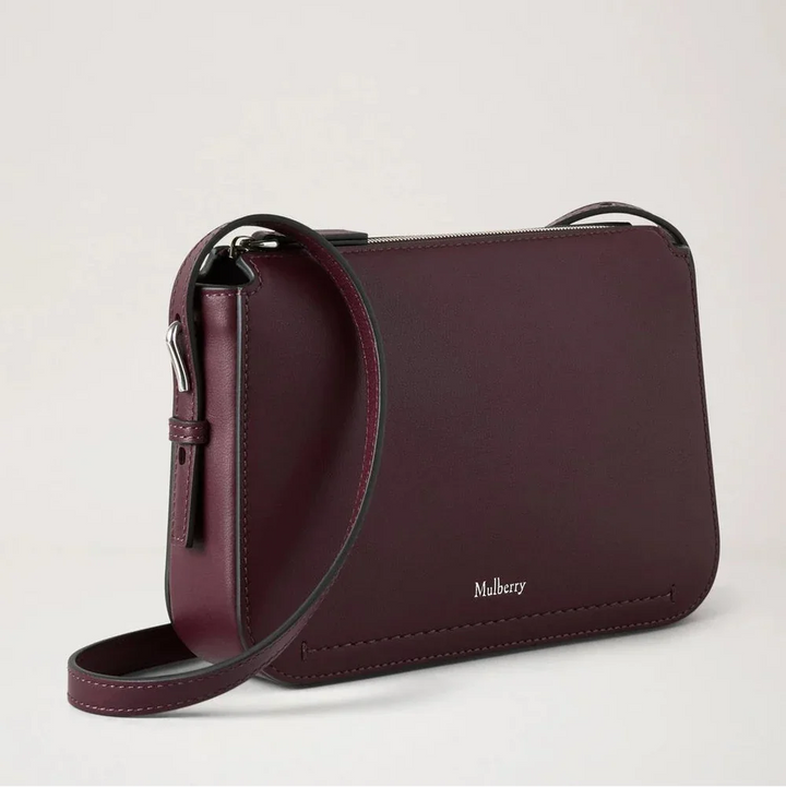 Mulberry Clovelly Pouch Black Cherry Micro Classic Grain shows an elegant dark red leather pouch with adjustable strap. Model RL8729587K560.