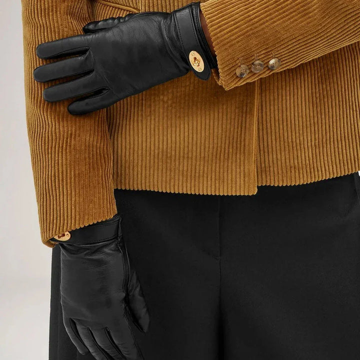 Mulberry Darley Gloves Nappa Leather Black shown worn on hands, classic black leather glove with gold detail. Model VG4150286A100-001